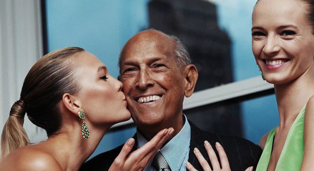 Oscar de la Renta receives a kiss from Karlie Kloss