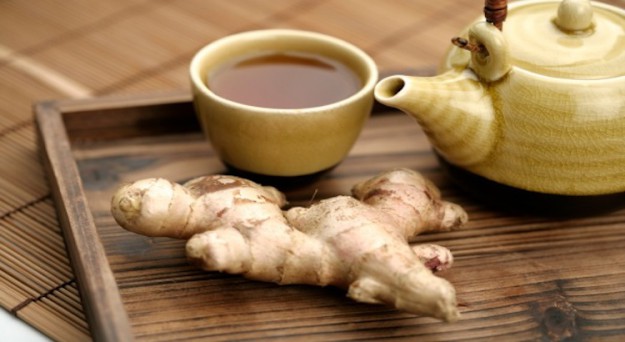 Chinese tea set on tray with ginger