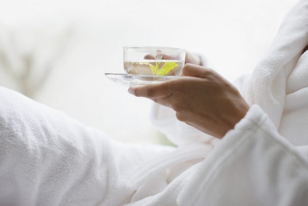 Close up of woman holding water